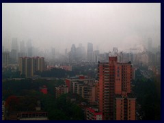 Gangding is a neighbourhood in the East part of Tianhe district. This is where our hotel, Yutong, was situated, this is the view from our room on the 21st floor on a foggy day, with Gangding closest and Tianhe's CBD in the distance. Nearby is the large Canton Fair.